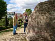 Arne showing me historical rune stone at the Jelling Kirke.